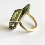 Bague « Grues et péridot aux jeanettes »